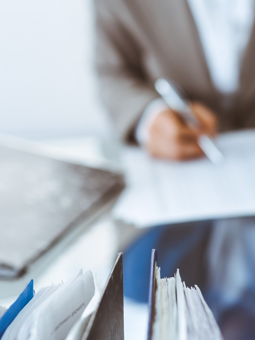 appellate woman at desk iStock-1211713863 crop